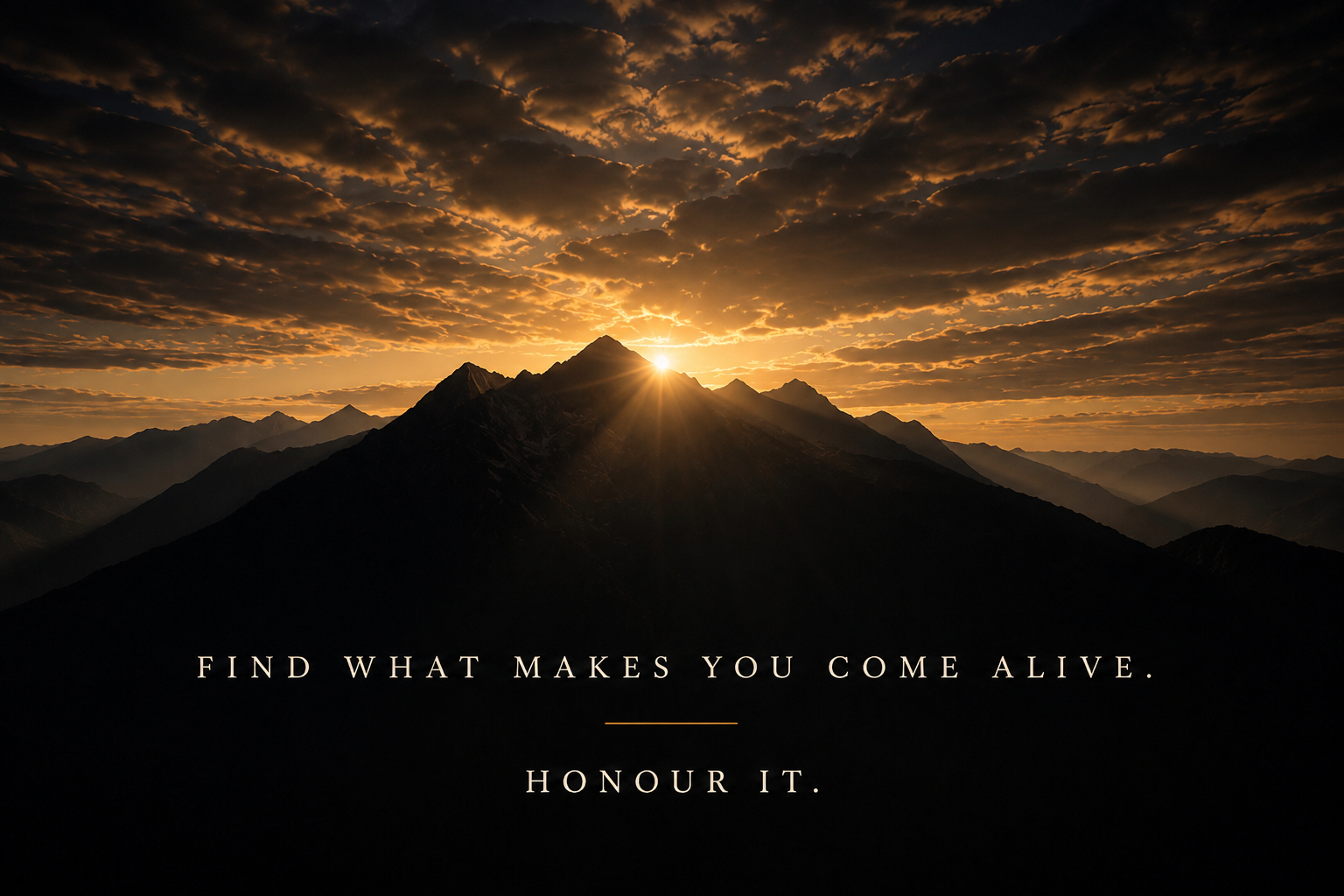 Sunrise breaking over a mountain range — find what makes you come alive, honour it